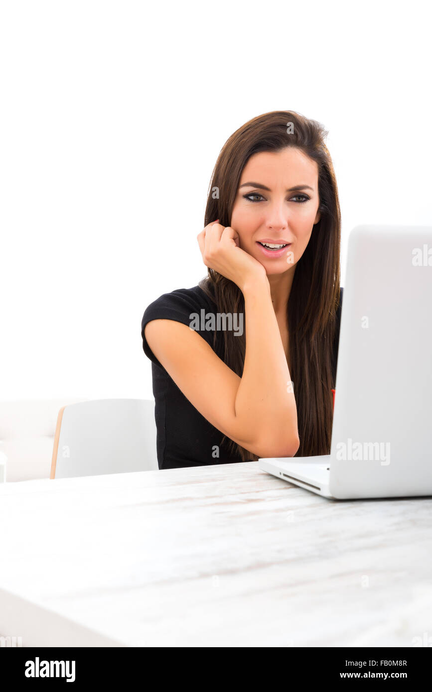 A young beautiful woman using a Laptop computer at home Stock Photo - Alamy