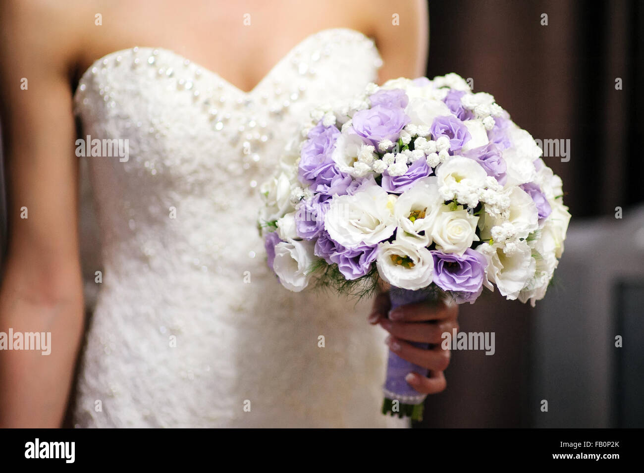 Women holding flower bouquet hi-res stock photography and images - Alamy