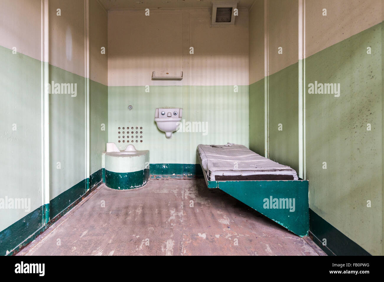 Empty prison cell at former United States penitentiary on Alcatraz island Stock Photo