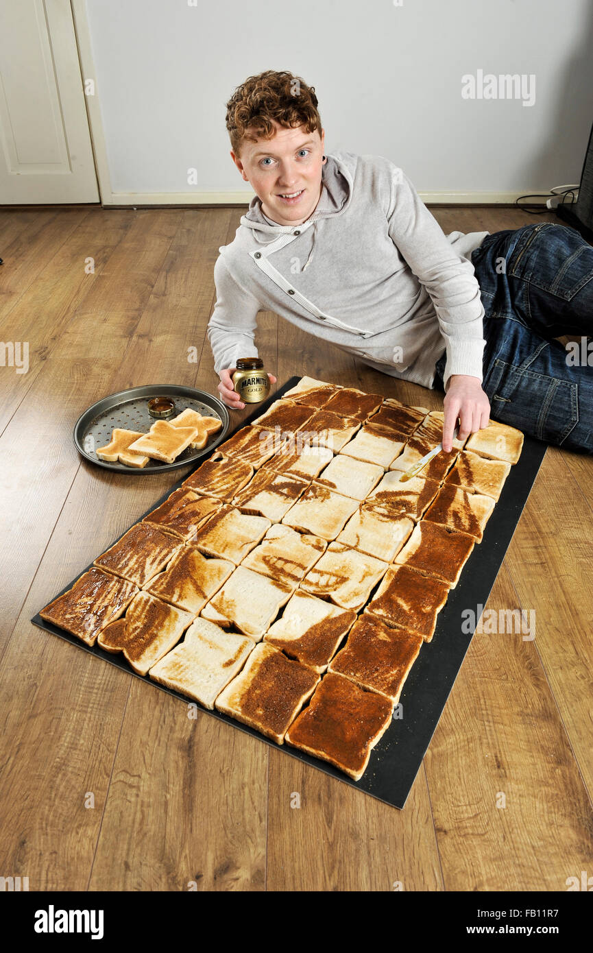 Welsh artist Nathan Wyburn with his portrait of Kate Middleton made from Marmite spread on toasted bread. Stock Photo