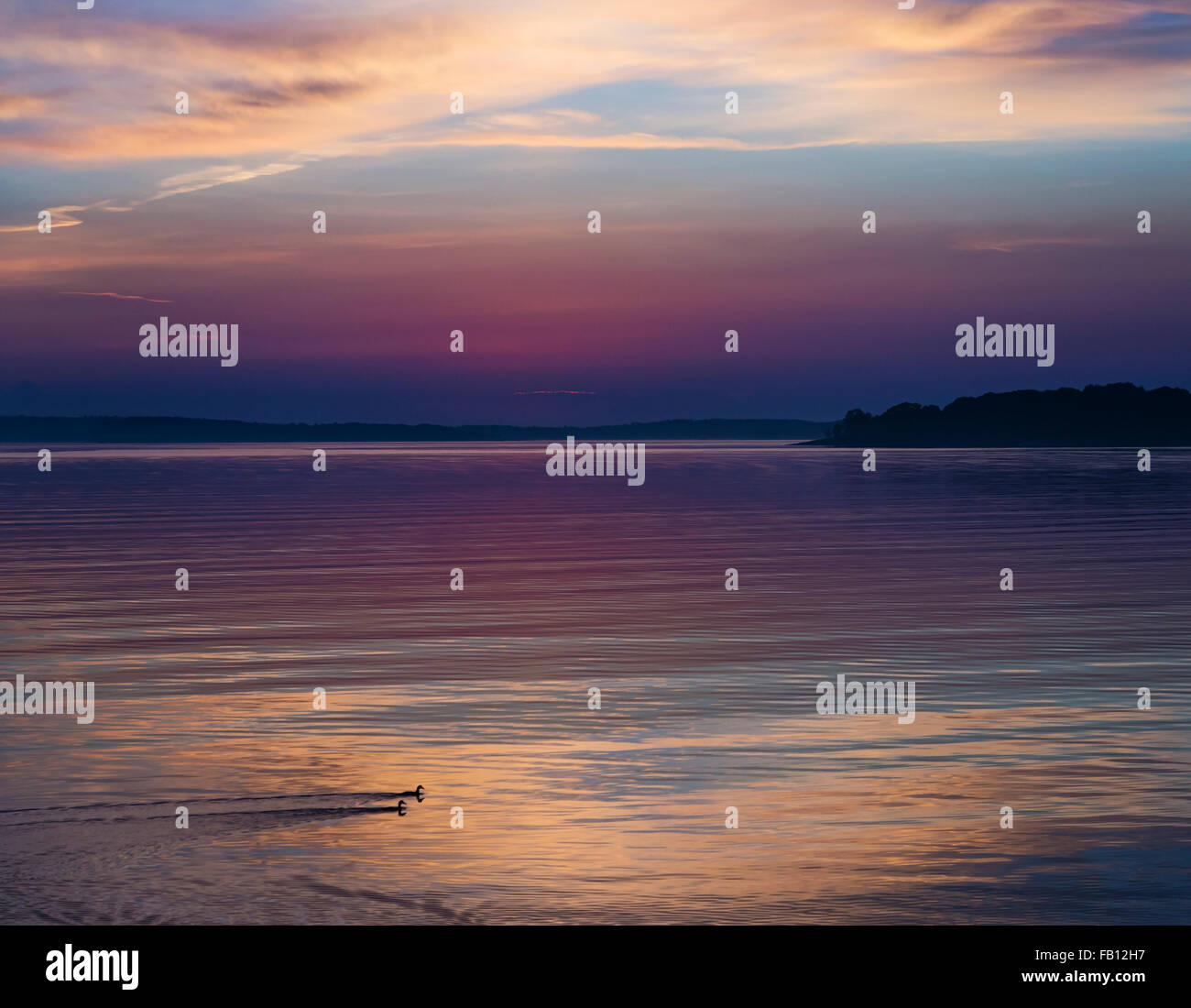 Colorful seascape at sunrise Stock Photo - Alamy