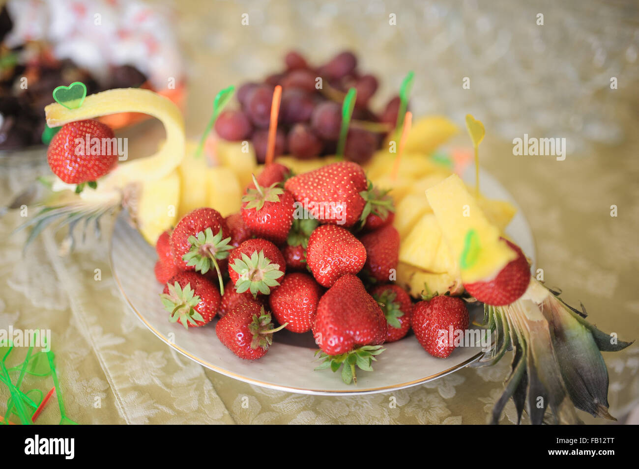nice looking and tasty pineapple and strawberry on wedding reception Stock Photo