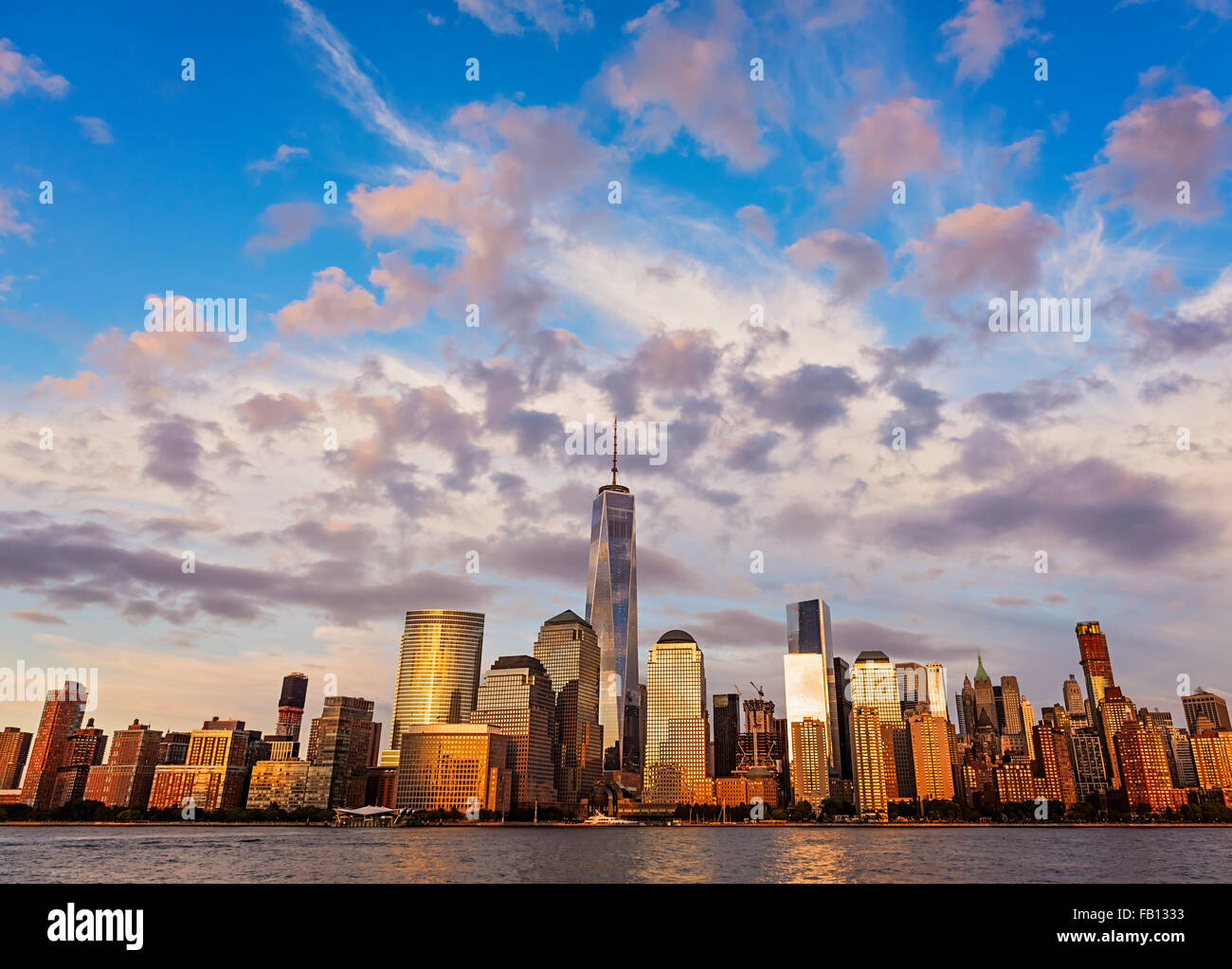 Lower manhattan skyline dusk clouds hi-res stock photography and images ...