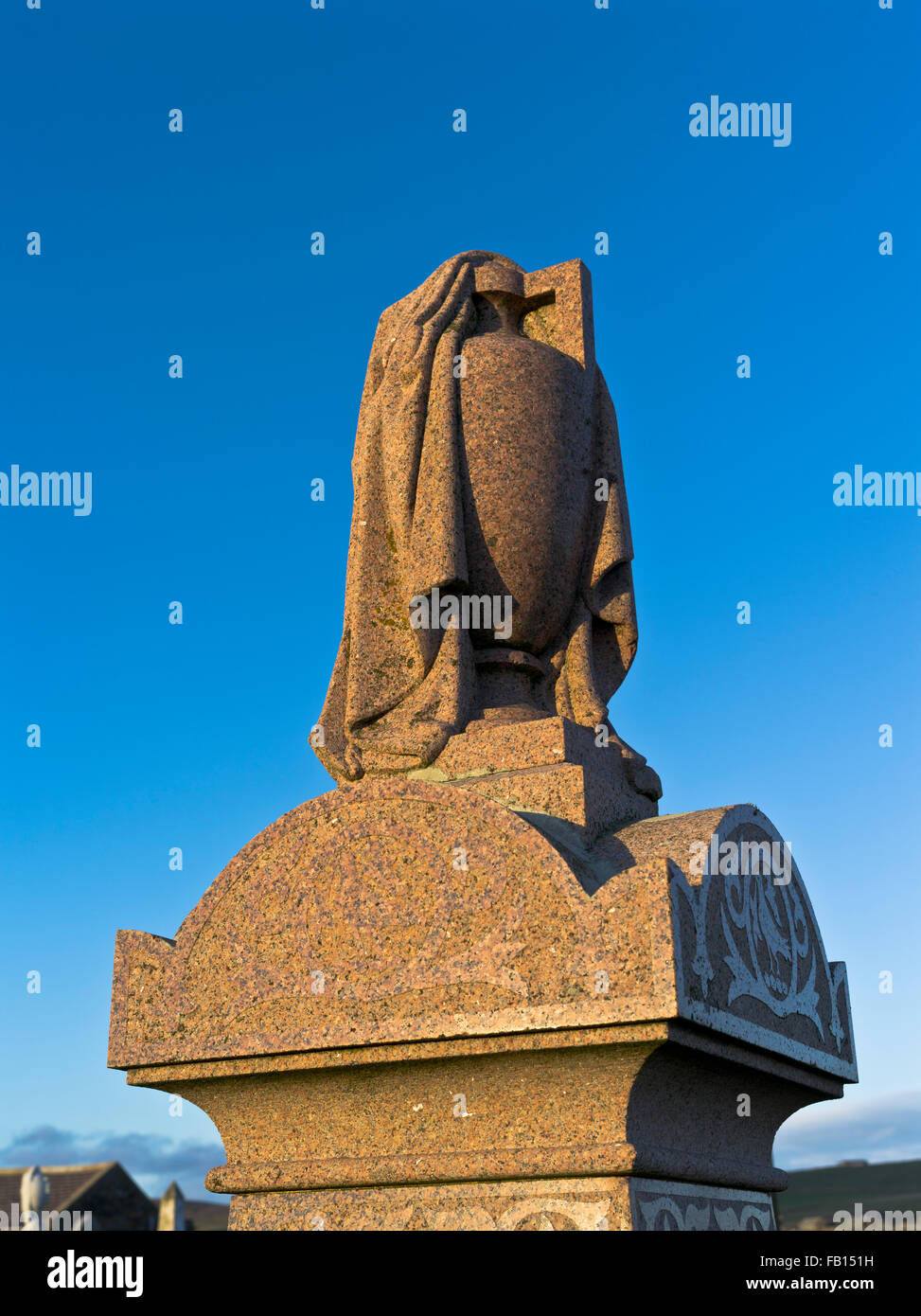 dh Grave CEMETERY UK Grave stone urn pink granite gravestone gravestones marble Stock Photo