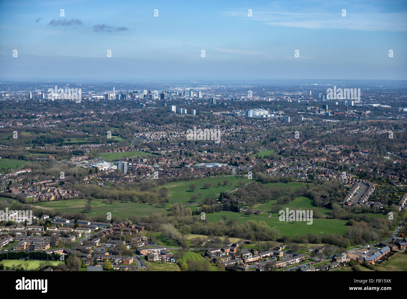An aerial view over the Birmingham suburb of Bartley Green with the City Centre visible in the distance Stock Photo