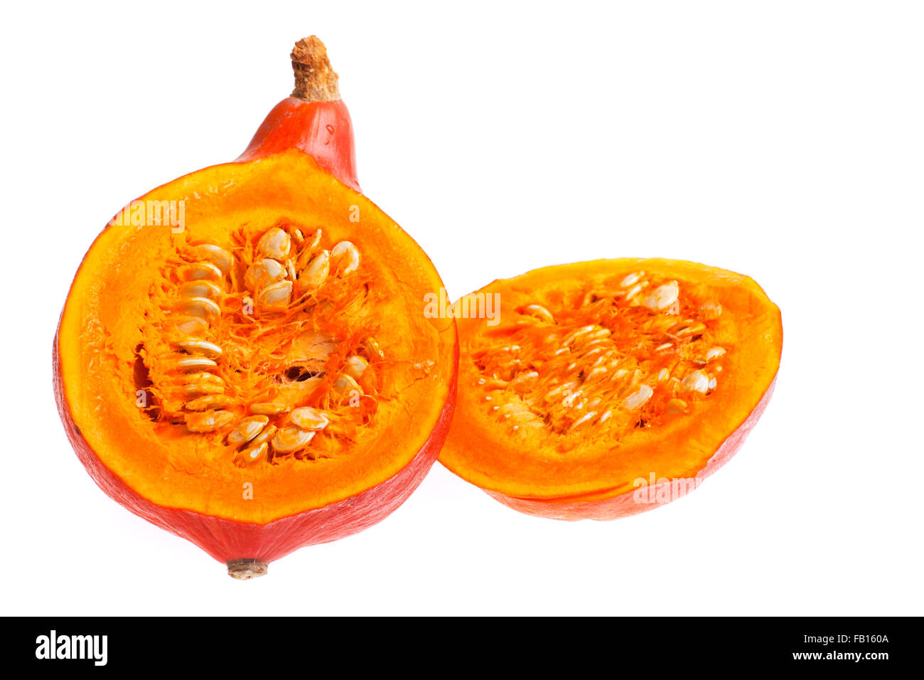 half of a hokkaido pumpkin isolated on white background Stock Photo - Alamy