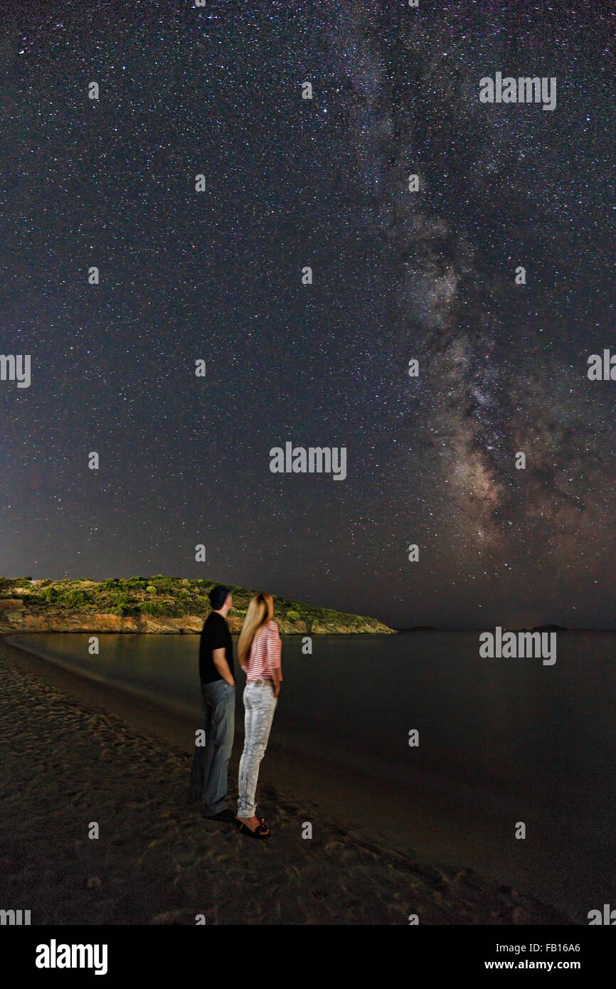Woman looking up sky night hi-res stock photography and images - Alamy