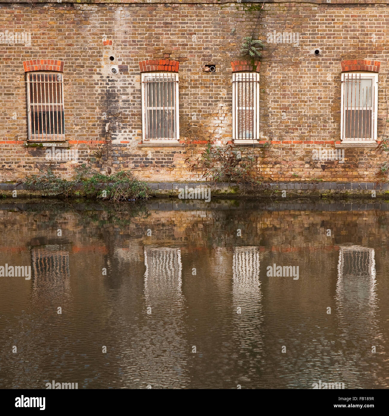 Grand Union Canal, England. Houses have been built on the Grand Union