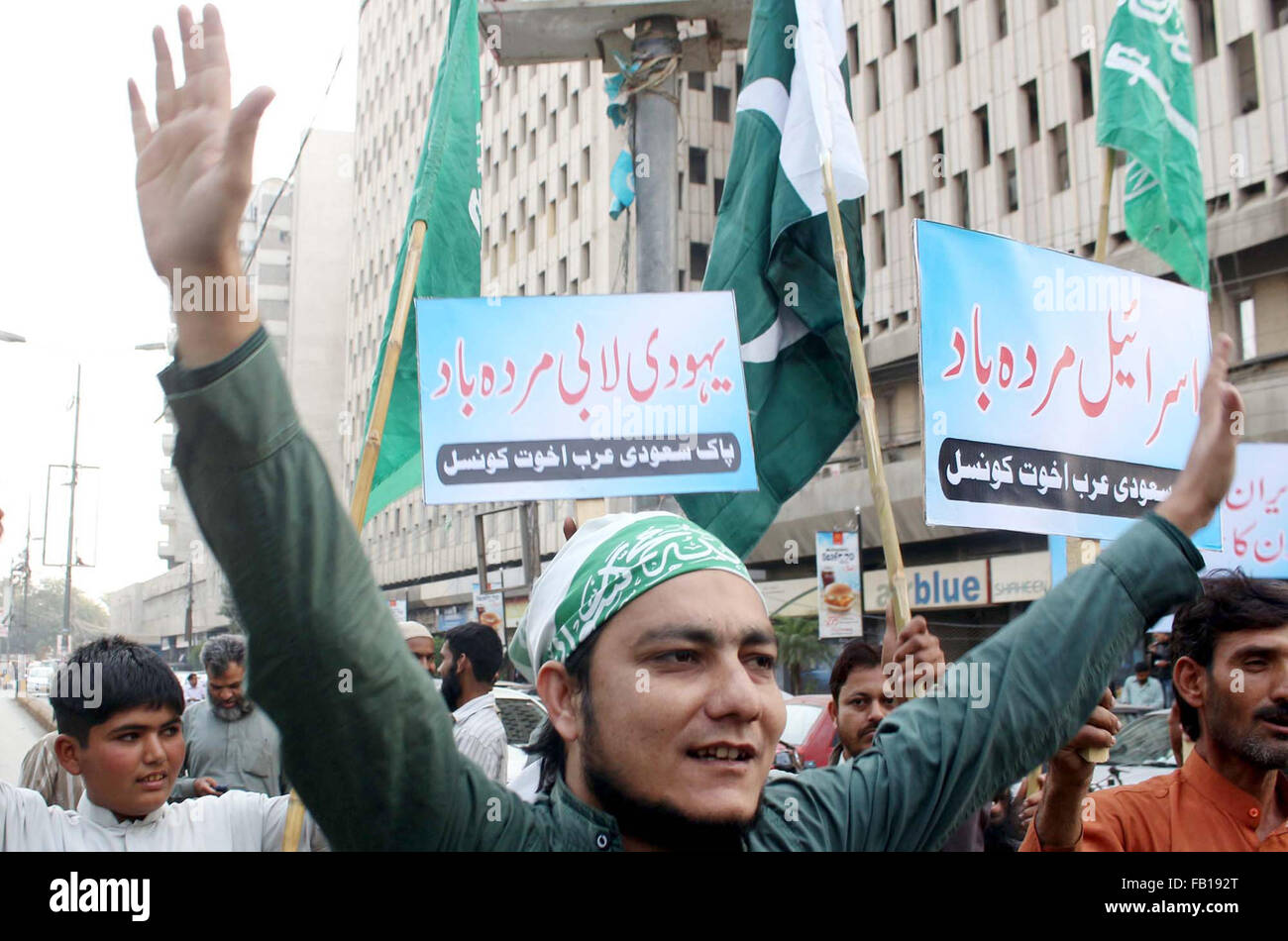 Members of Pak Saudi Arabia Akhowat Council chant slogans against America, Israel and Iran during protest demonstration at Karachi press club on Thursday, January 07, 2016. Stock Photo