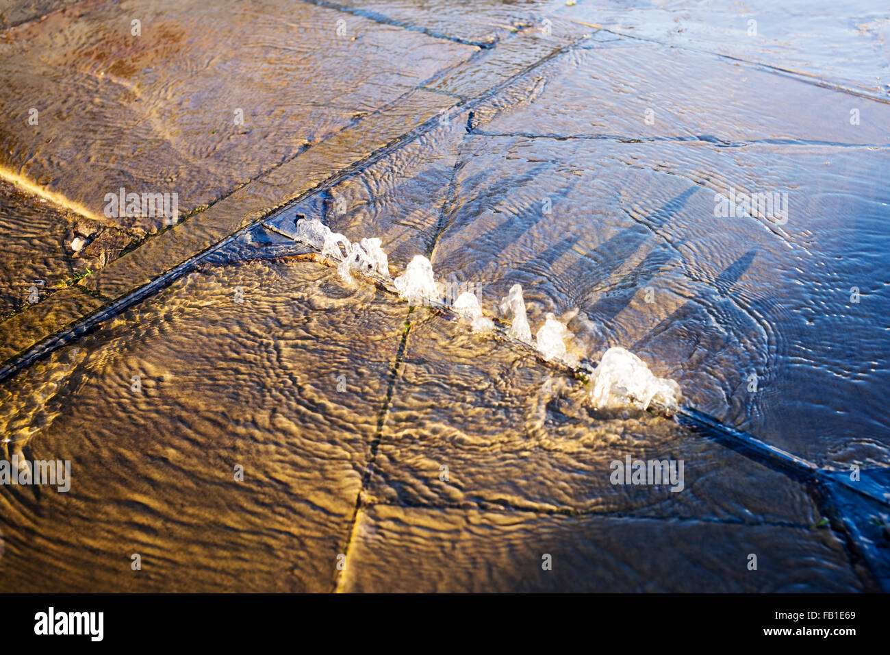 Water flooding manhole hi-res stock photography and images - Alamy