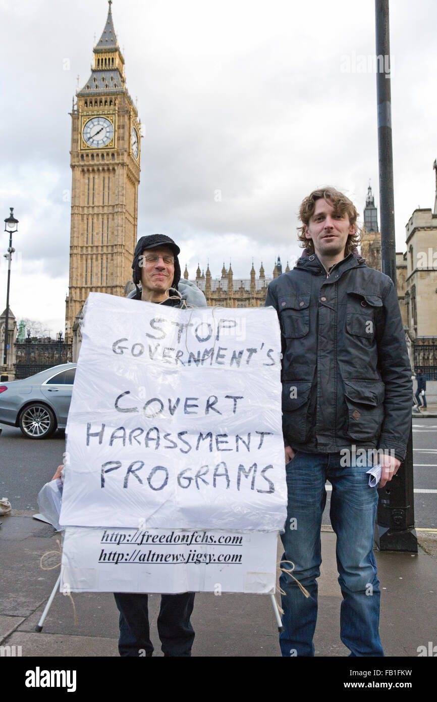 London, UK. 7th January, 2016. Activists take part in a vigil against 'covert harassment and surveillance' in Parliament Square. Credit:  Mark Kerrison/Alamy Live News Stock Photo