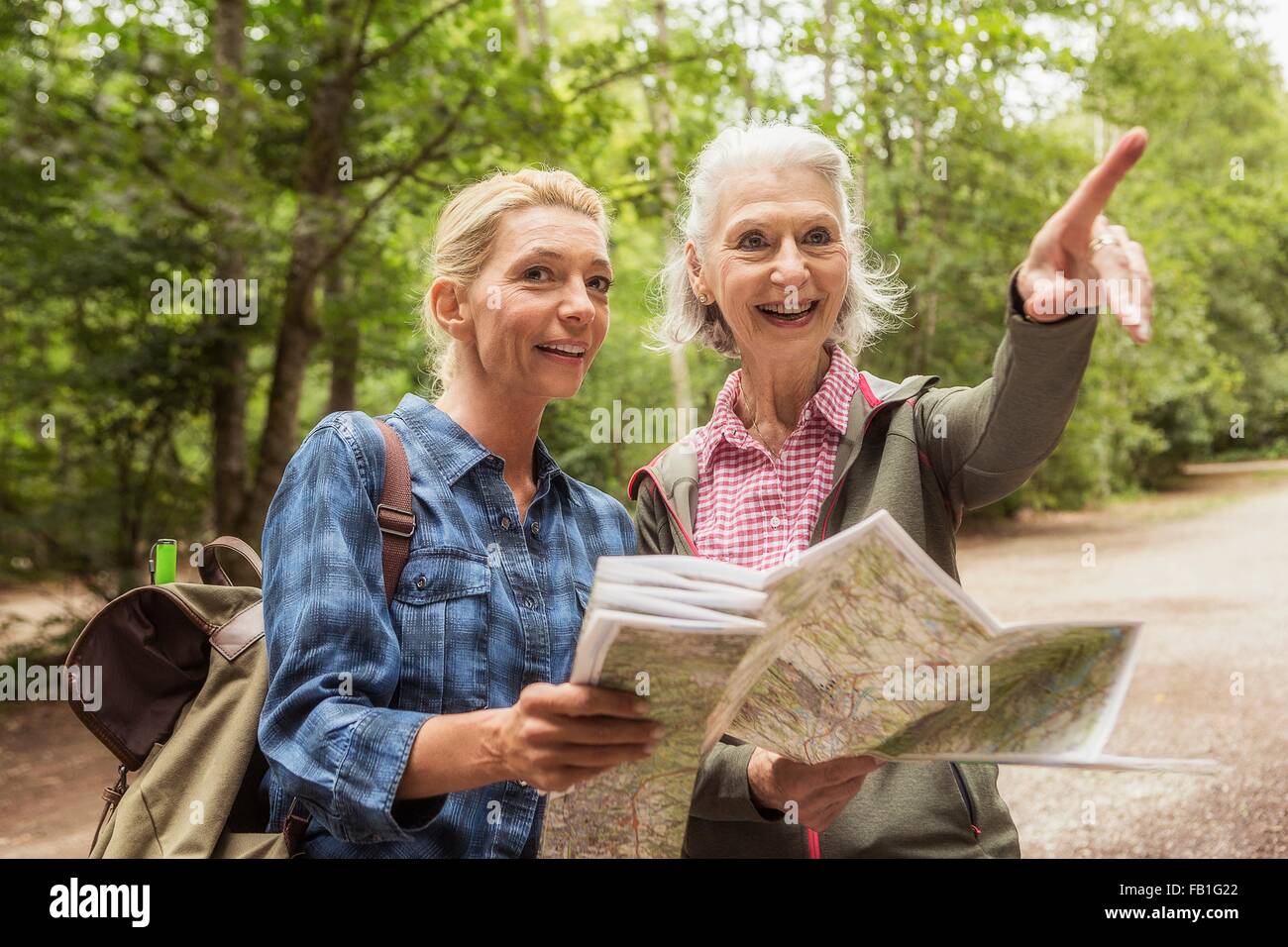Mature woman hiking on trail hi-res stock photography and images - Alamy