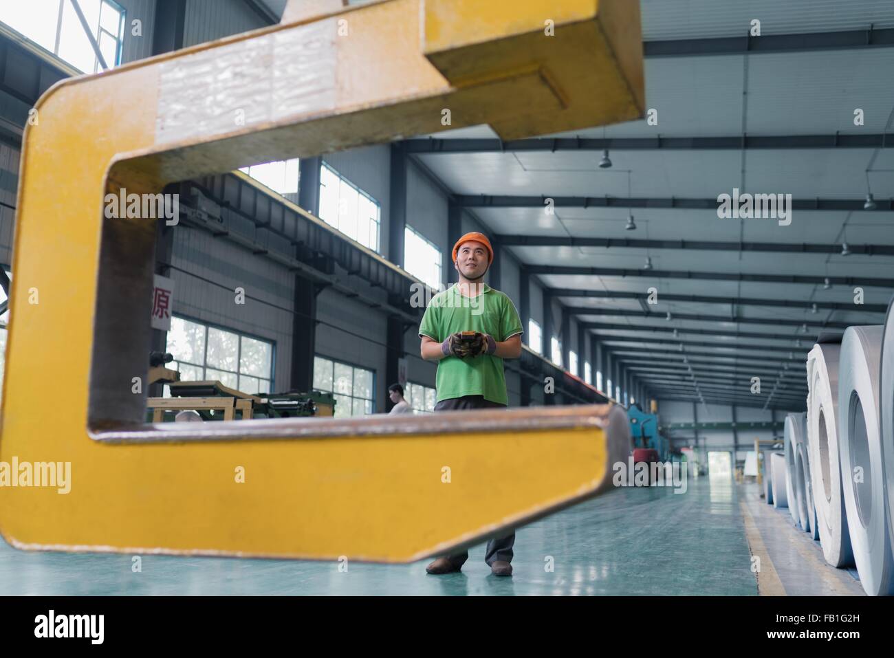 Worker in solar panel assembly factory, Solar Valley, Dezhou, China Stock Photo