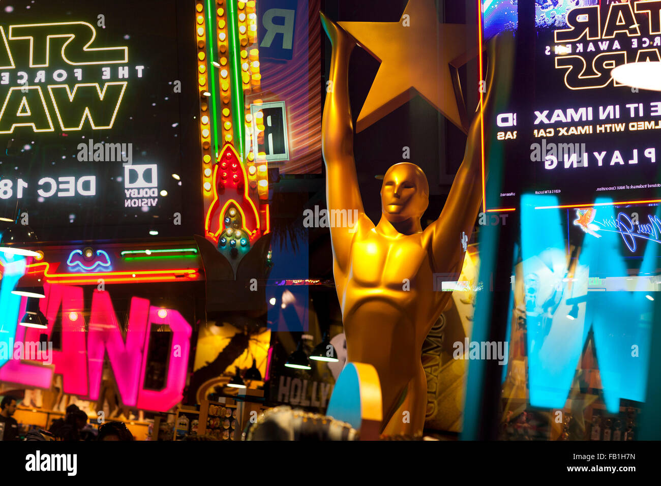 "Oscar" statue in a souvenir shop with reflections from Hollywood