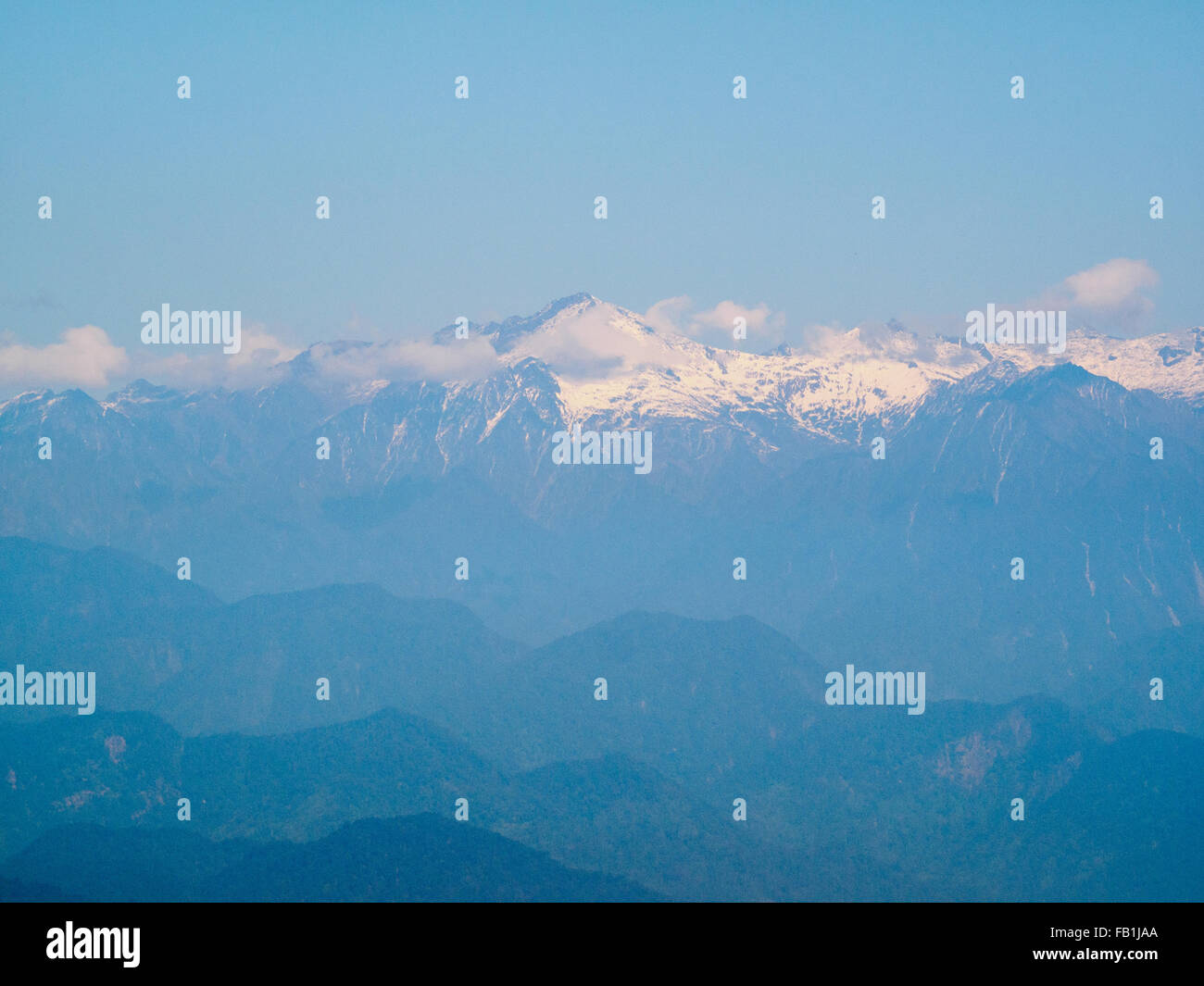 Snow-capped mountains seen from Putao town Stock Photo