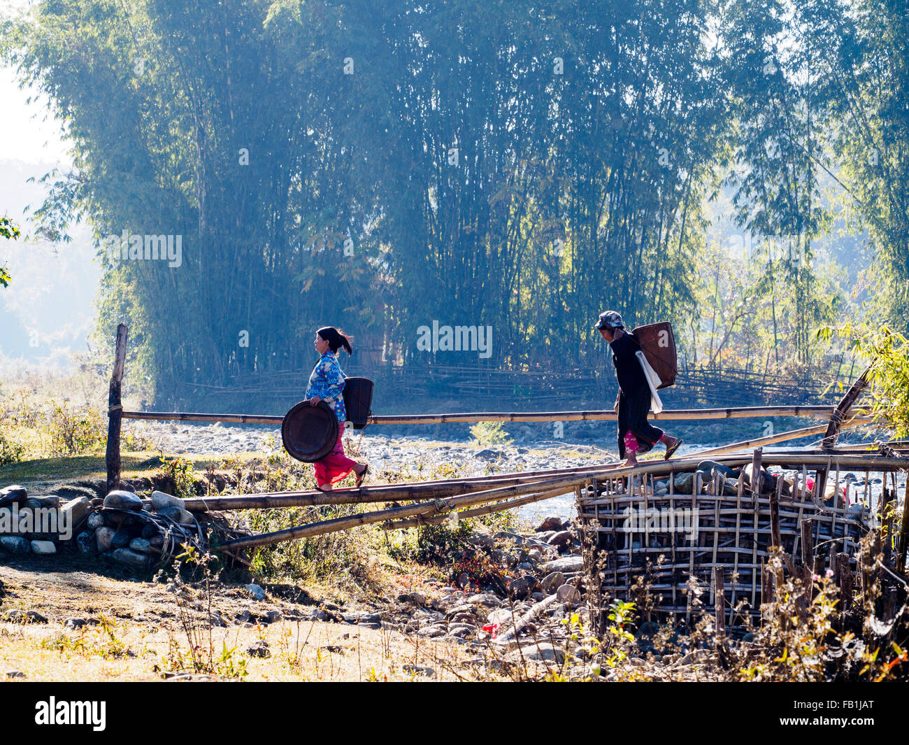 Lisu women going out to nearby forest to collect firewood. Stock Photo