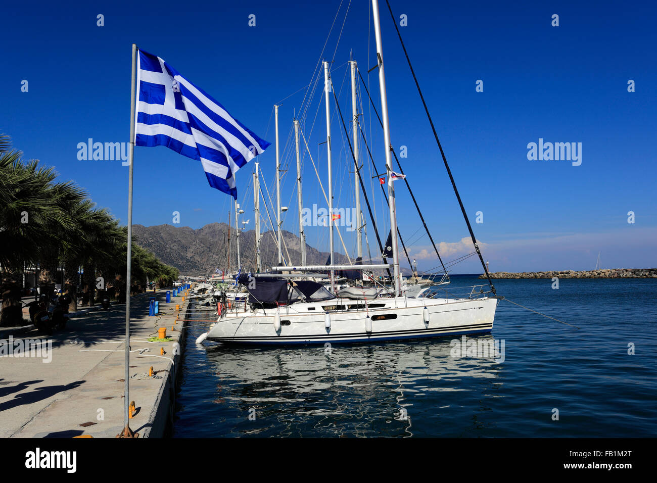 Sailing and fishing boats in Kardamena village harbour, Kos Island, Dodecanese group of islands, South Aegean Sea, Greece. Stock Photo