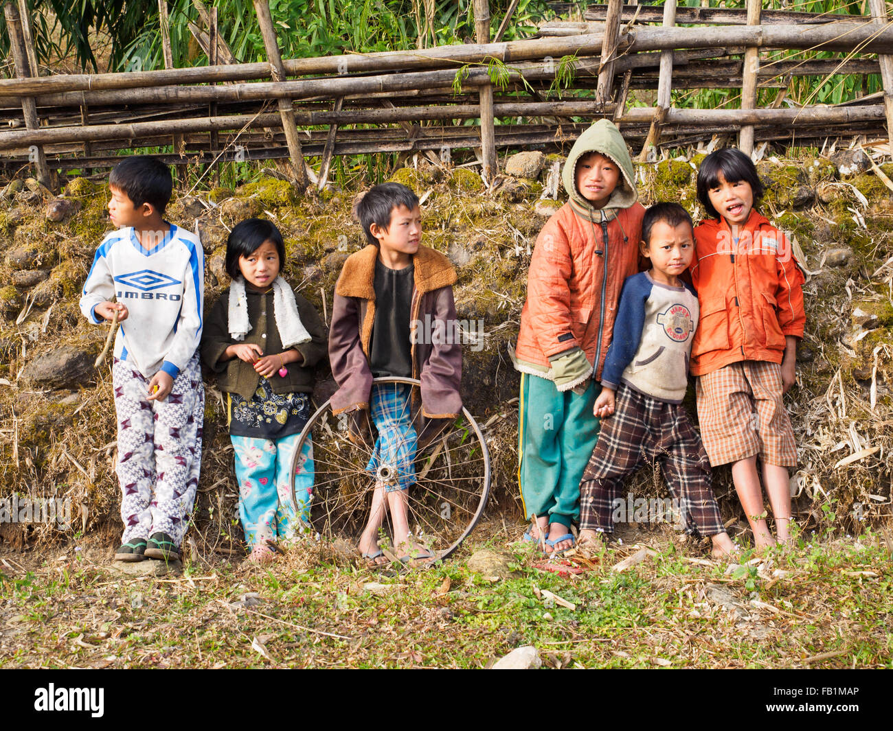 Lisu kids playing together in the morning, Northern Myanmar Stock Photo