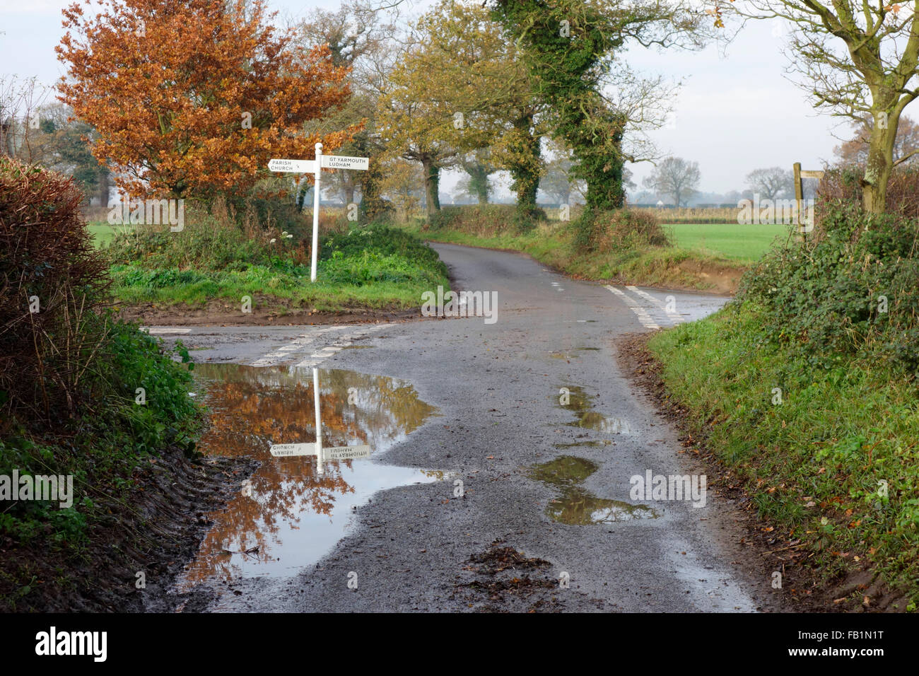 Signpost along a rural country lane in Horning Stock Photo
