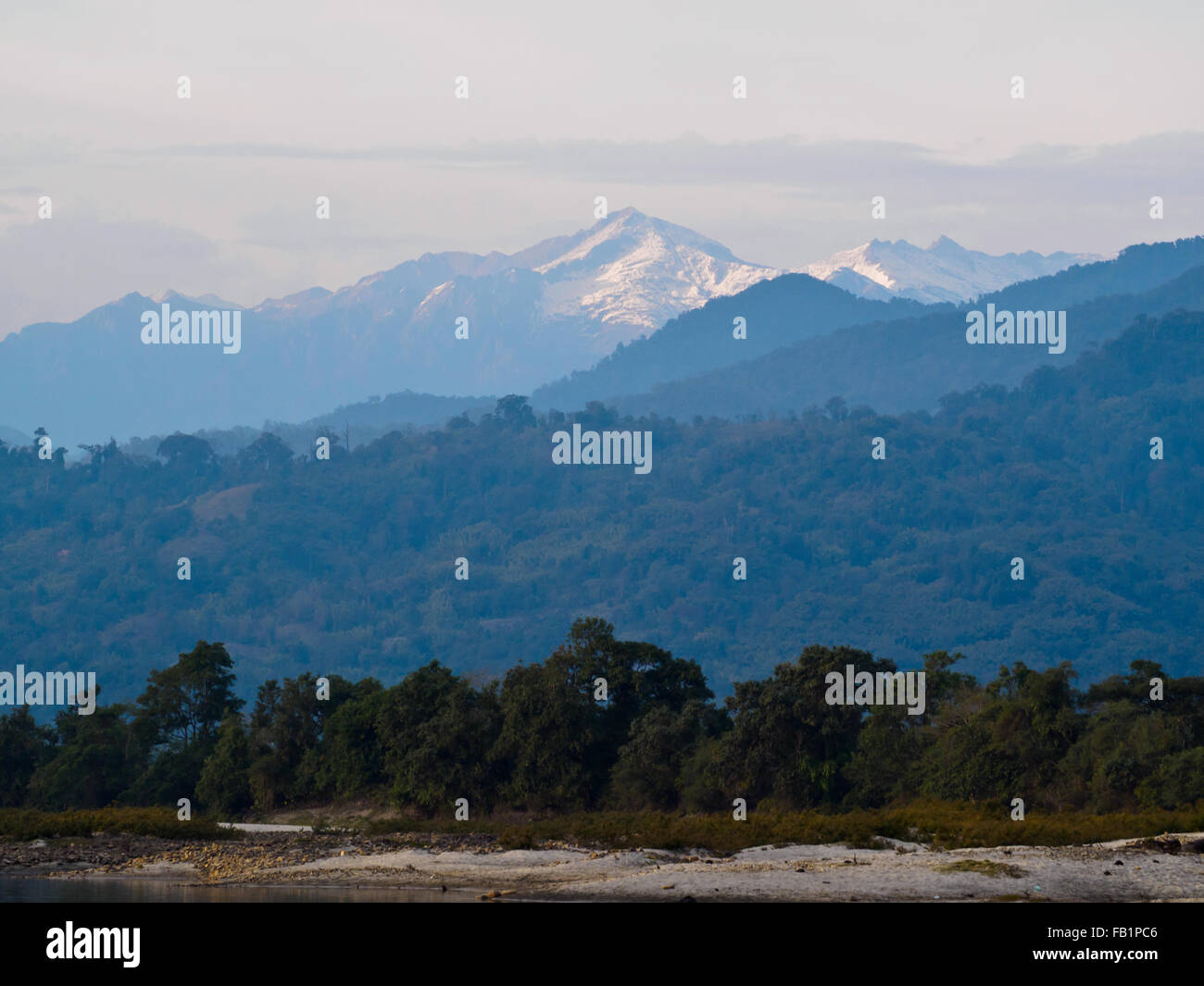 The beautiful scenery of snow-capped mountains at Nam Kham village, northern Myanmar. Stock Photo