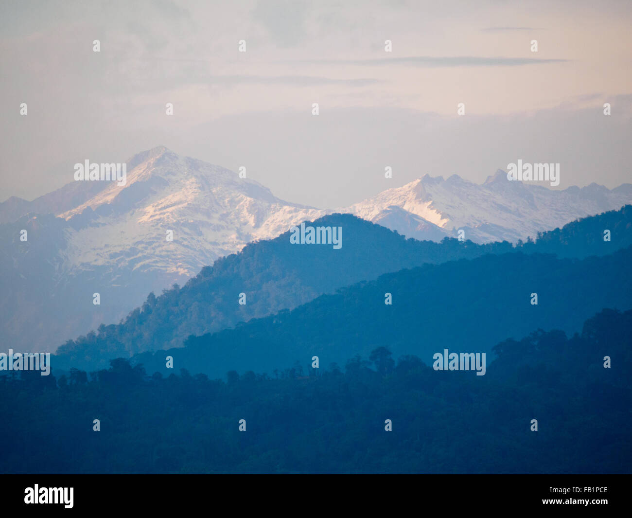 The beautiful scenery of snow-capped mountains at Nam Kham village, northern Myanmar. Stock Photo