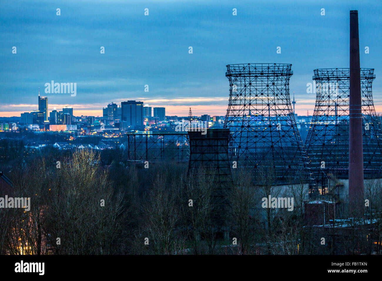 Skyline of the city of Essen, Germany, business district, city center, old cooling tower steel skeleton at Zeche Zollverein, Stock Photo