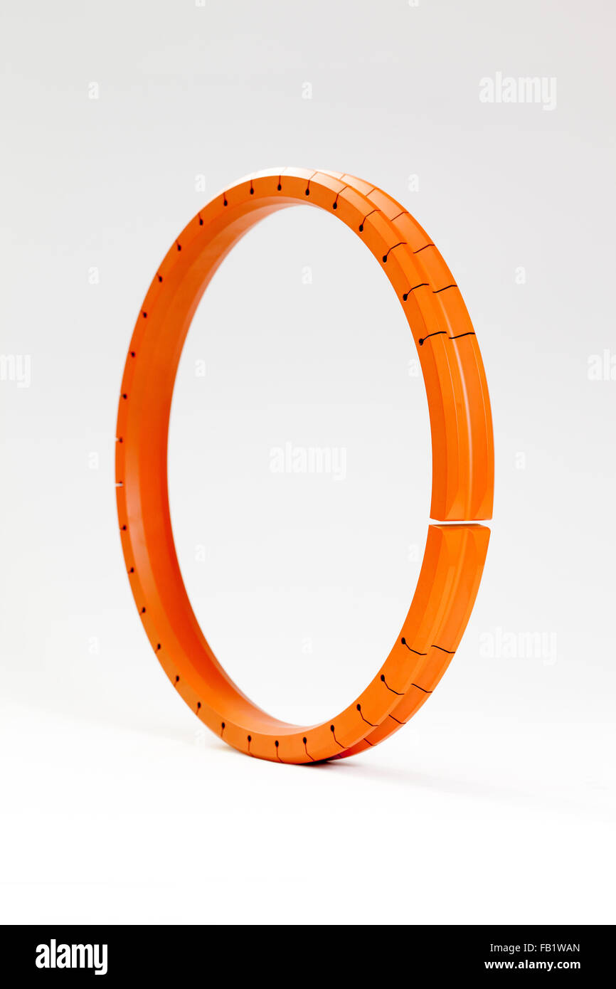 industrial component gasket seal in high contrast colour against a plain background Stock Photo