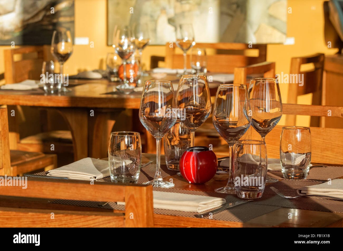 Interior of a restaurant with empty glasses on tables, London England United Kingdom UK Stock Photo