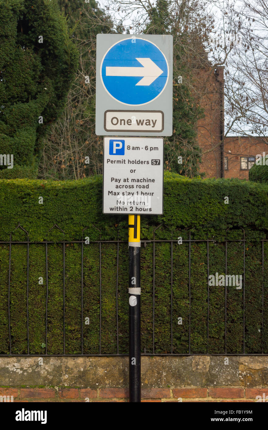 A one way and parking restriction sign in StratforduponAvon Stock
