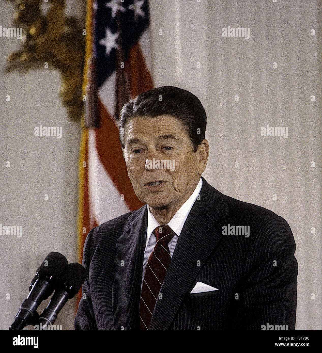 Washington, DC., USA, 25th June, 1985 President Ronald Reagan talks about the space shuttle program in the East Room of the White House. This was for the final selection for a teacher to go in space on the shuttle. Christa McAuliffe was picked as the teacher to go into space. She died when the shuttle Challenger exploded in 1986.  Credit: Mark Reinstein Stock Photo
