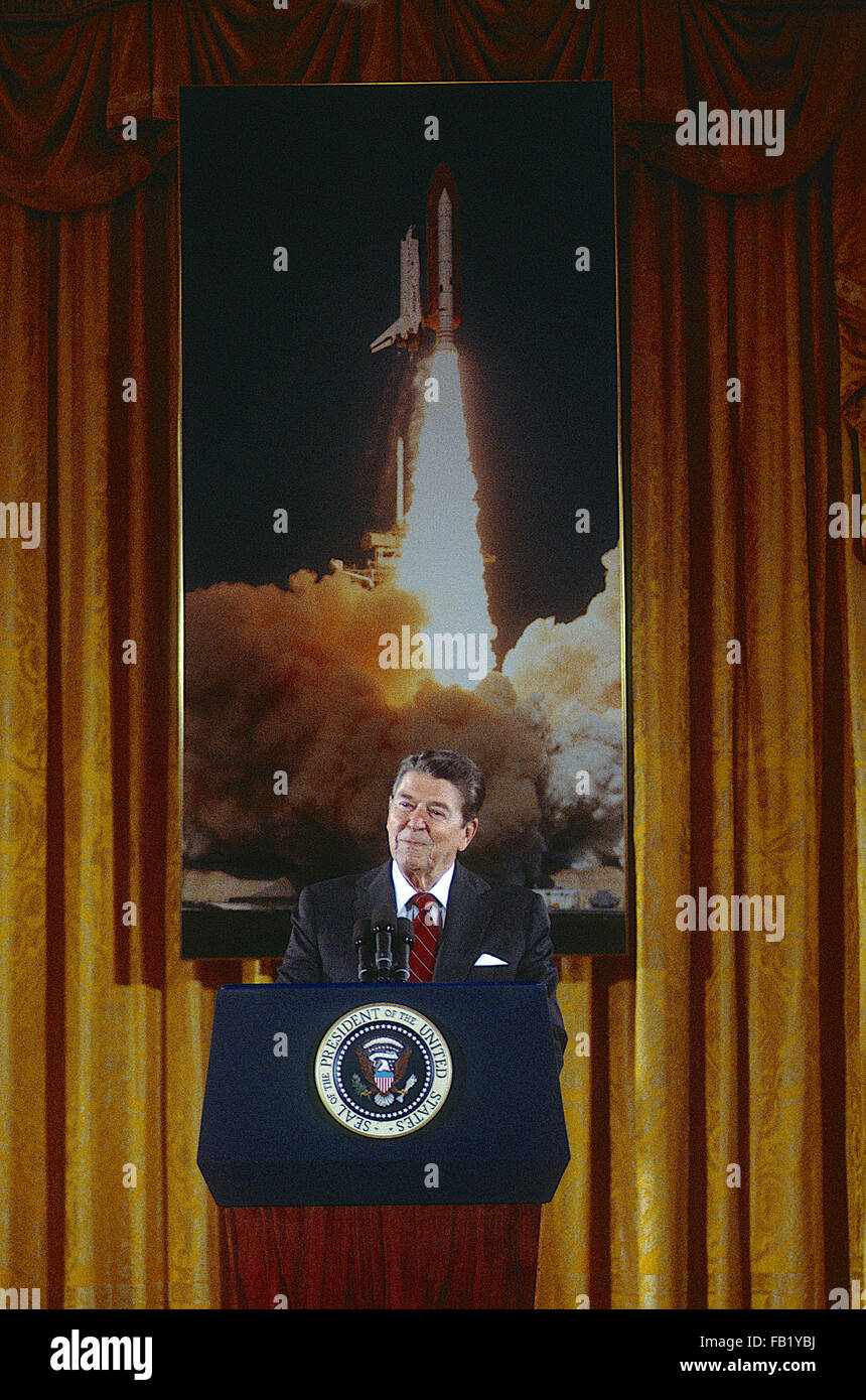 Washington, DC., USA, 25th June, 1985 President Ronald Reagan talks about the space shuttle program in the East Room of the White House. This was for the final selection for a teacher to go in space on the shuttle. Christa McAuliffe was picked as the teacher to go into space. She died when the shuttle Challenger exploded in 1986.  Credit: Mark Reinstein Stock Photo