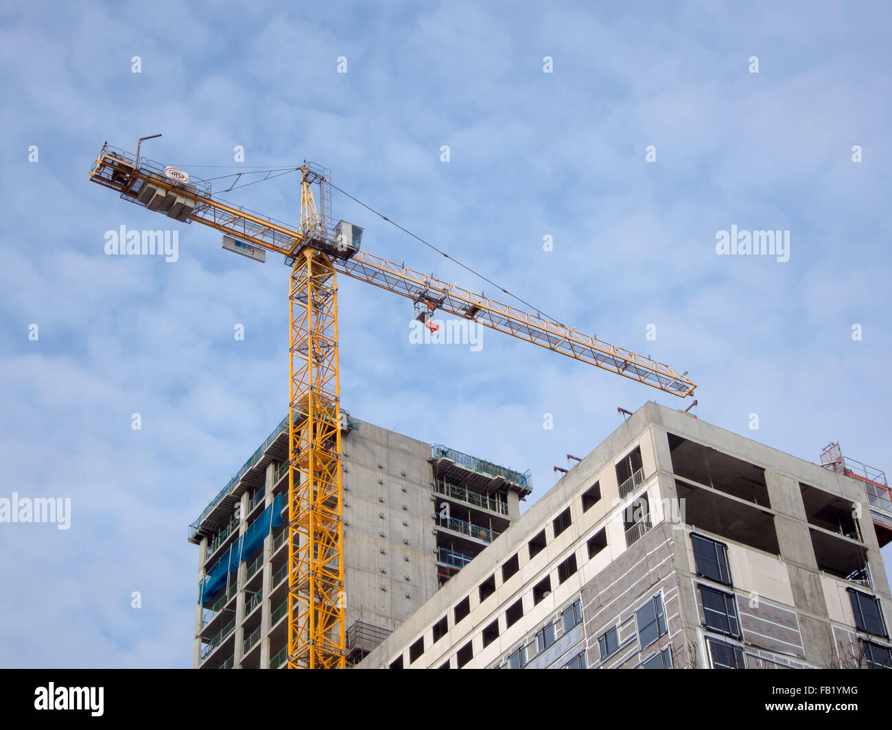 A high crane on a construction site Stock Photo Alamy