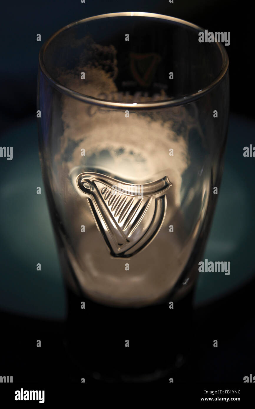 Guinness harp logo on the Guinness glass Stock Photo