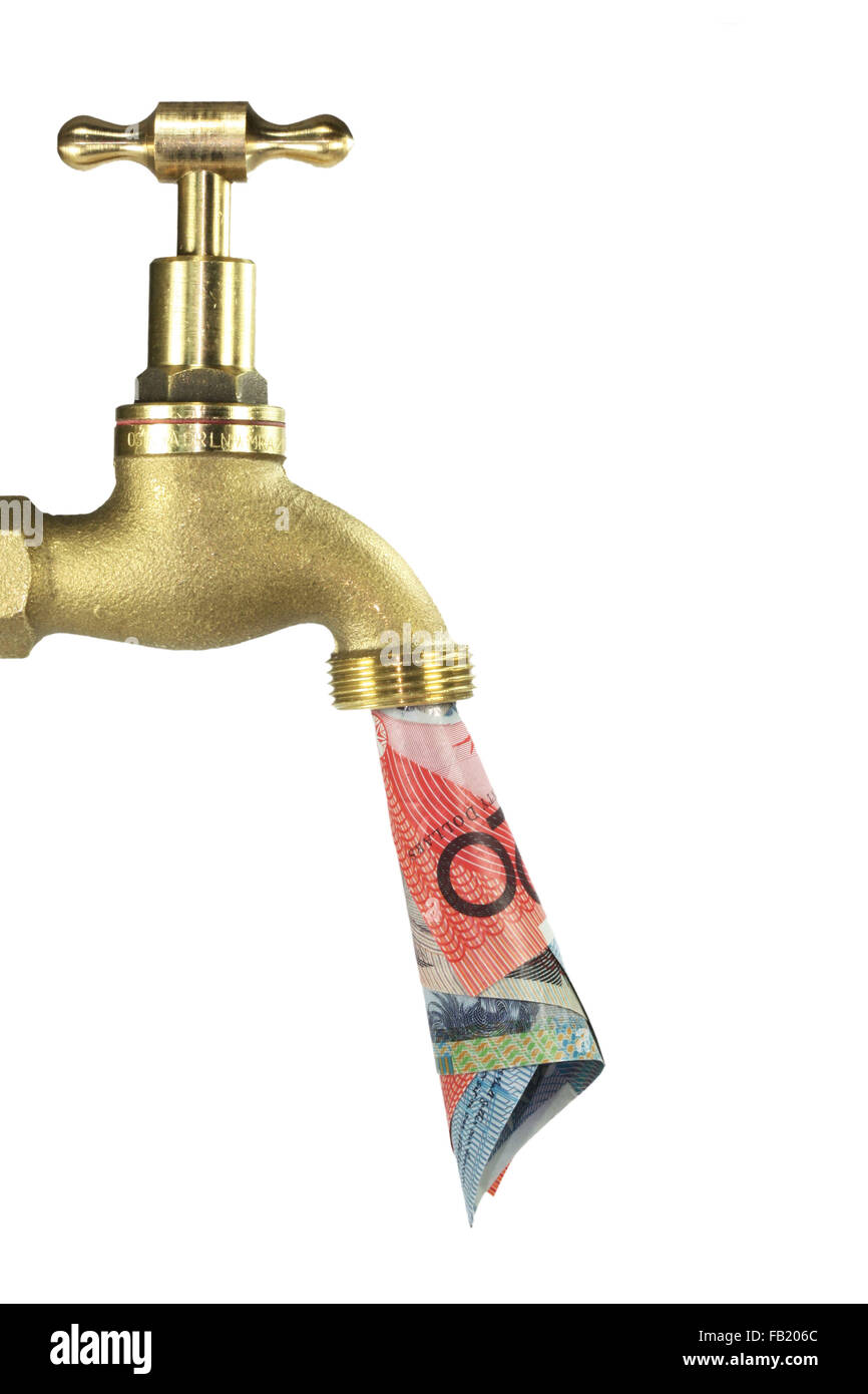 a brass tap with notes on a white background Stock Photo