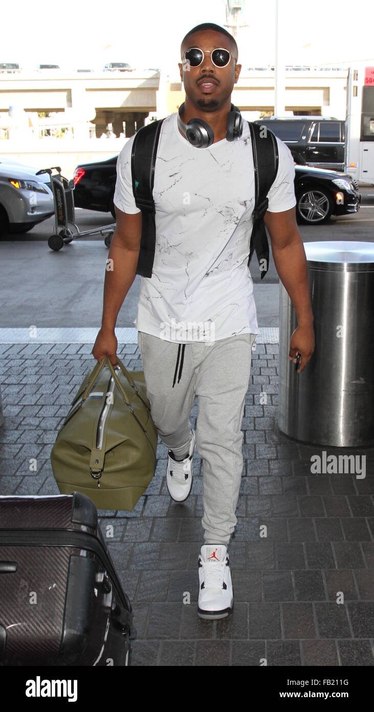 Creed' star Michael B. Jordan departs on a flight from Los Angeles  International Airport (LAX) carrying a backpack and holdall Featuring: Michael  B. Jordan Where: Los Angeles, California, United States When: 07