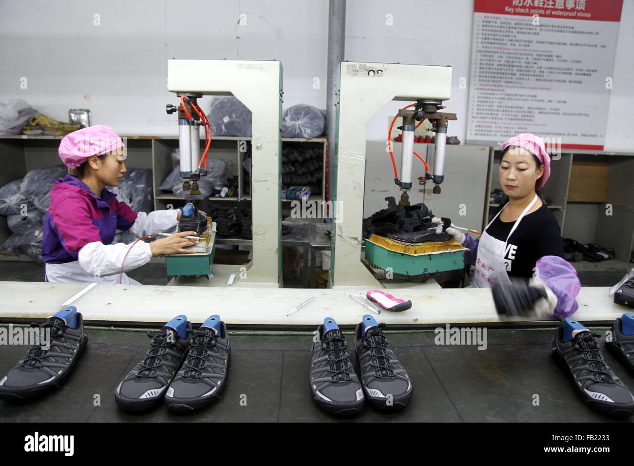 Putian, China's Fujian Province. 7th Jan, 2016. Workers make shoes for  export at an OEM shoemaking factory in Putian, southeast China's Fujian  Province, Jan. 7, 2016. Putian, an OEM shoemaking base, has