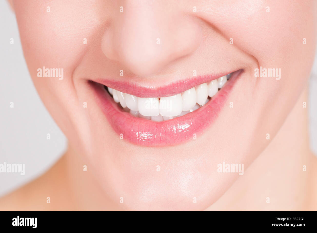 Close up of a young woman's big smile with clean white teeth Stock Photo