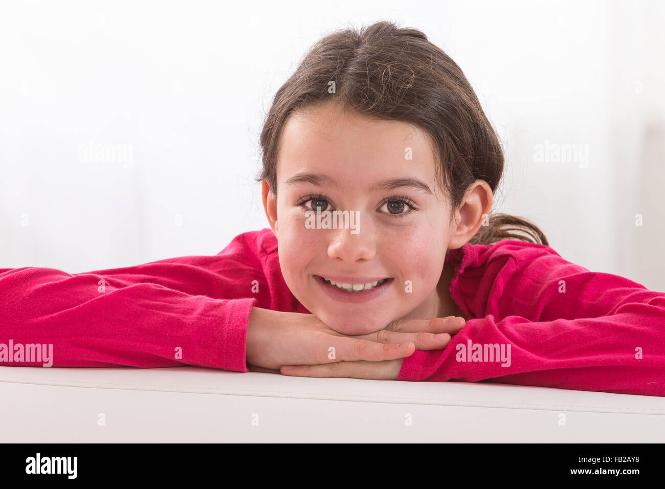Portrait of smiling girl isolated on white Stock Photo - Alamy