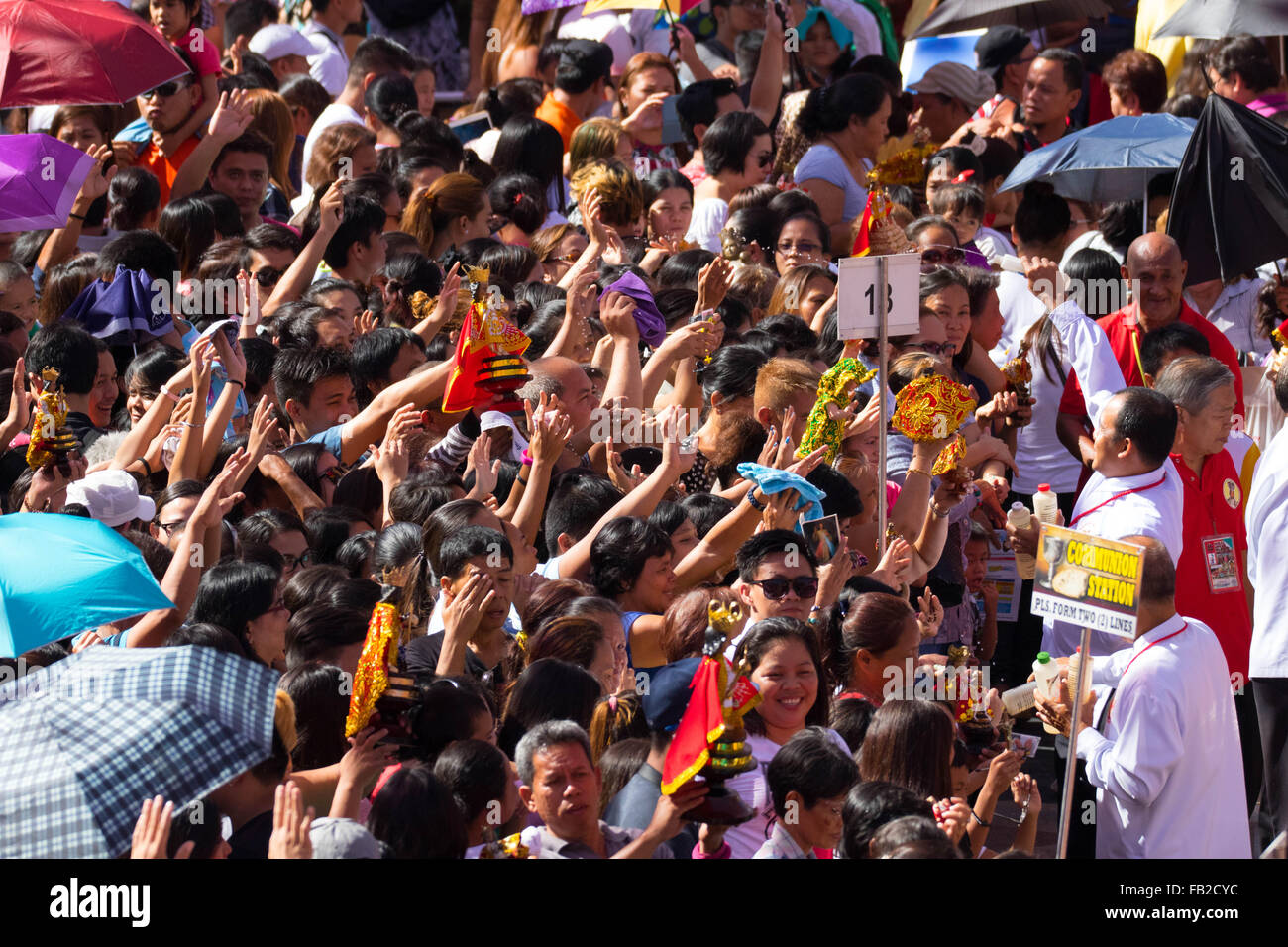 Cebu City, Philippines. 08th Jan, 2016. A Roman Catholic Solemn Mass held in the Basilica Minore del St.Nino on the second day of the Fiesta Señor (Sinulog). A nine day religious festival honouring the Santo Nino De Cebu (Holy Child of Cebu). Many devotees bring with them a Santo Nino figurine representing the Child Jesus. Credit:  imagegallery2/Alamy Live News Stock Photo