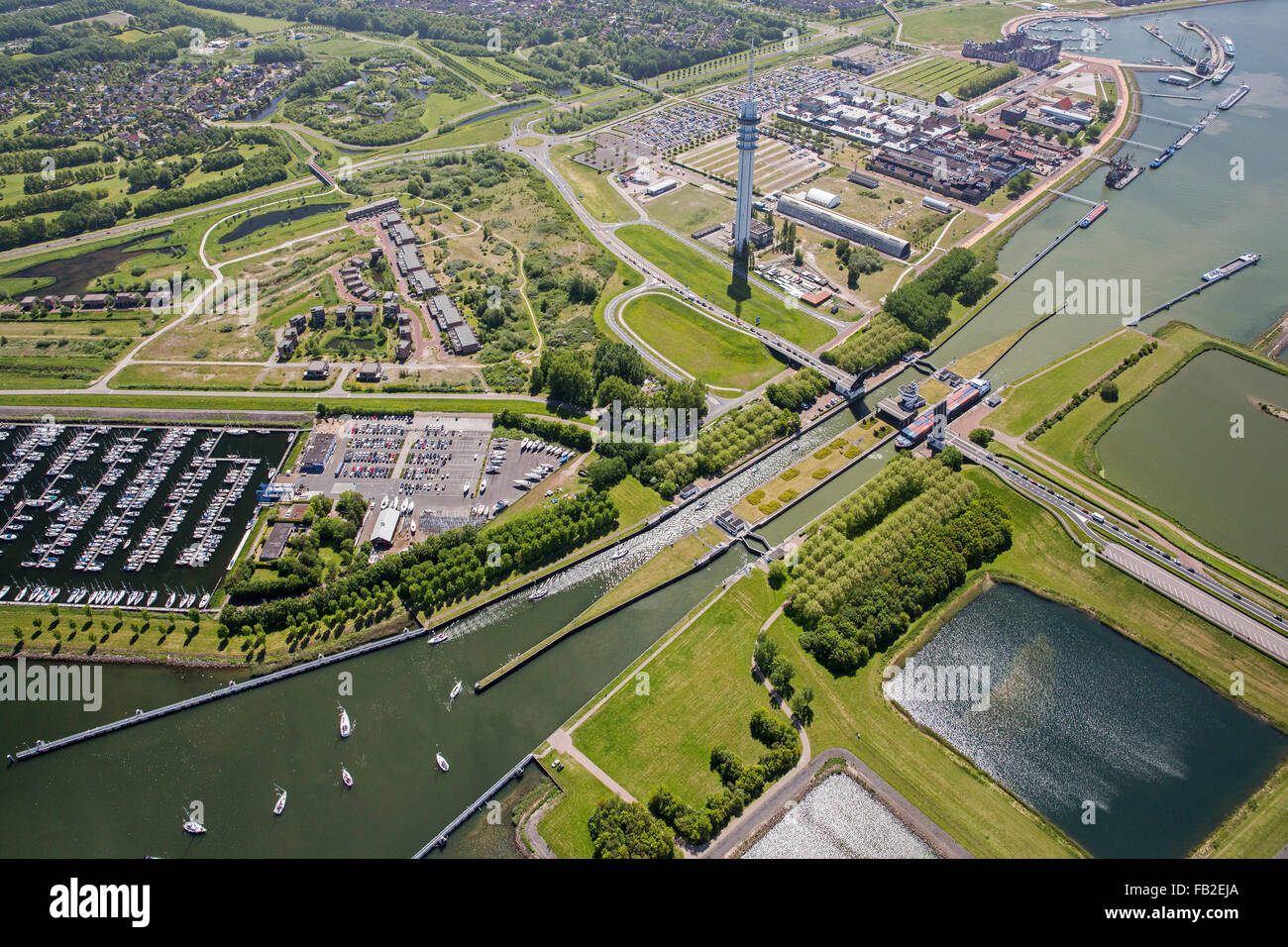 Netherlands, Lelystad, Broadcasting tower, locks, marina, aerial Stock Photo