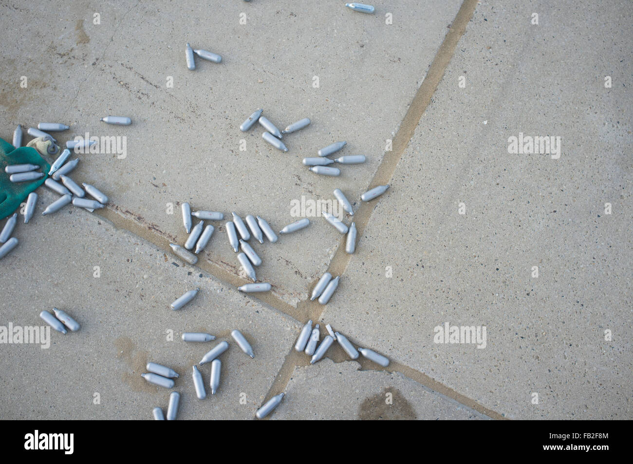 Laughing gas (nitrous oxide) canisters at the seaside Stock Photo Alamy
