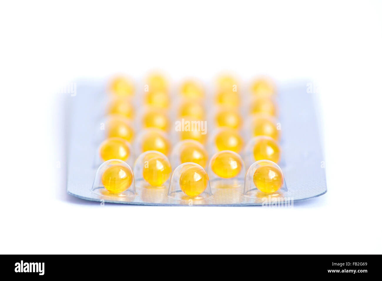 yellow medication in a complete package Stock Photo