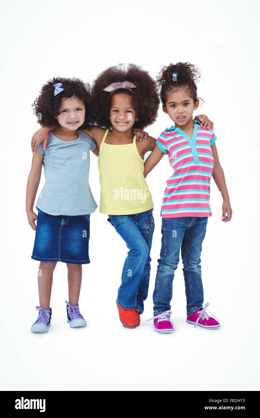 Cute girls hugging and looking at camera Stock Photo - Alamy