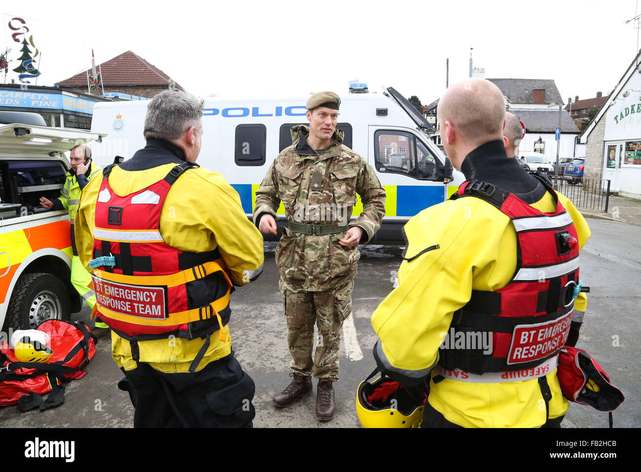 The BT emergency response team along with the army at the flood damaged bridge in Tadcaster, North Yorkshire. Stock Photo