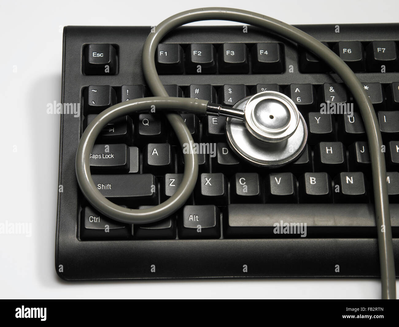 Silver laptop black stethoscope hi-res stock photography and images - Alamy