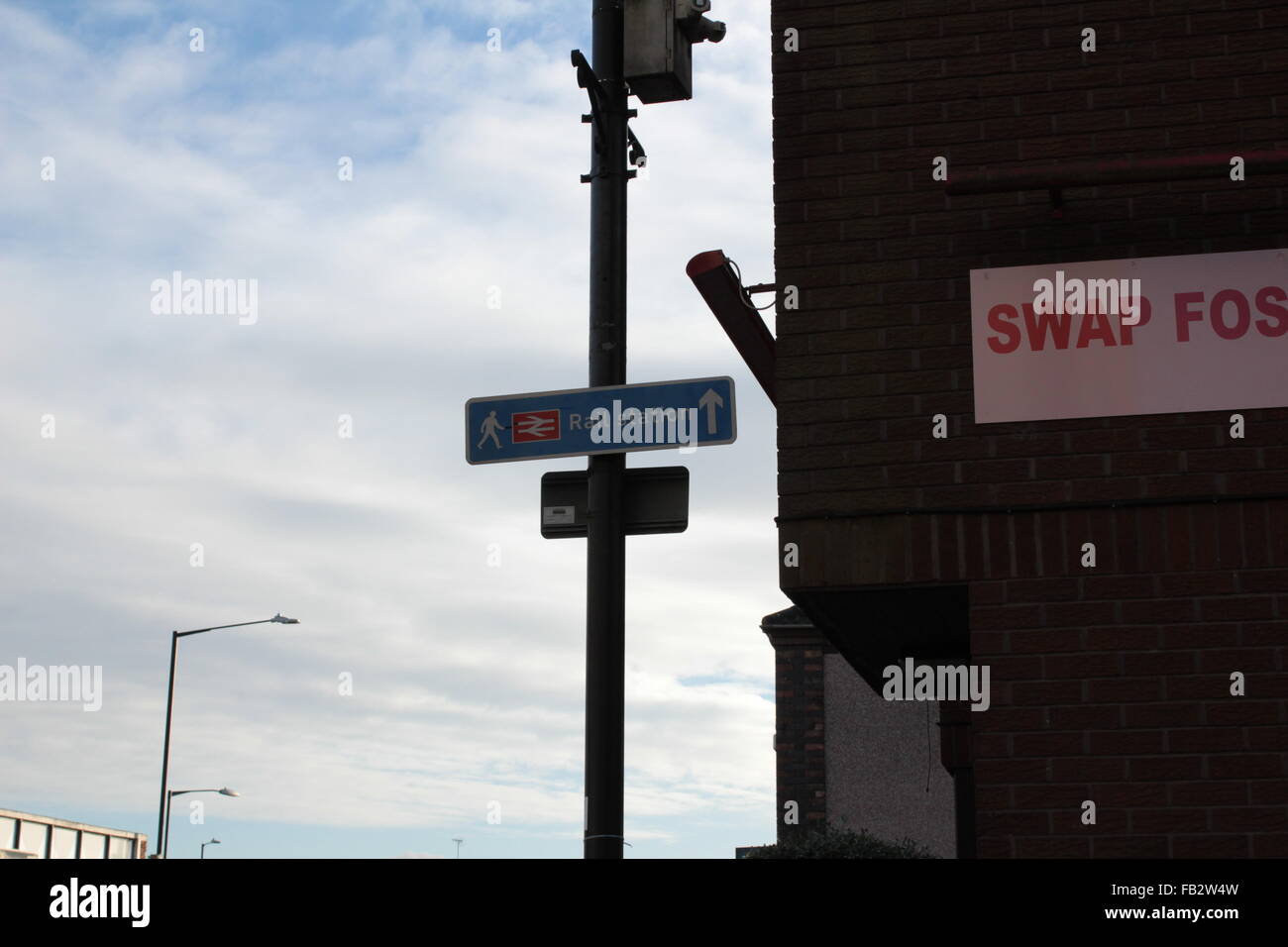 Street sign blue sky arrow symbol hi-res stock photography and images ...