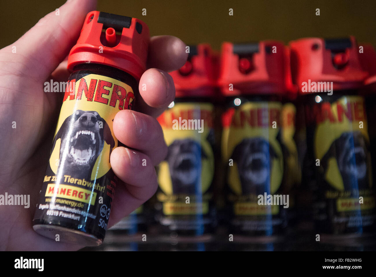 Dozens of bottles of pepper spray are on display at weapons shop in