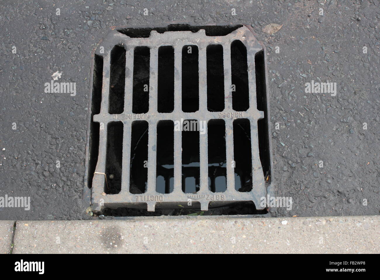 Cast iron drain cover for rain water Stock Photo Alamy