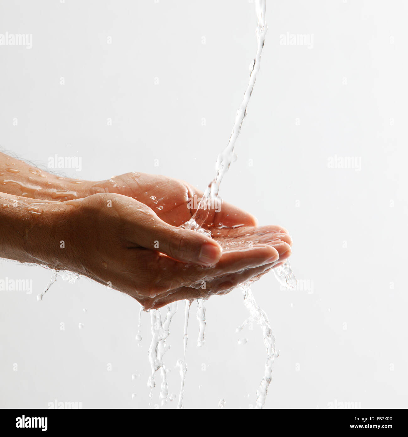 Handful of water Stock Photo - Alamy