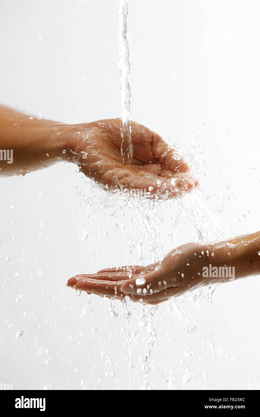 man catching pouring water Stock Photo - Alamy